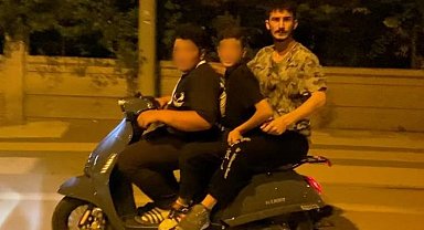 Motosiklette 2'si çocuk 3 kişinin tehlikeli yolculuğu kamerada