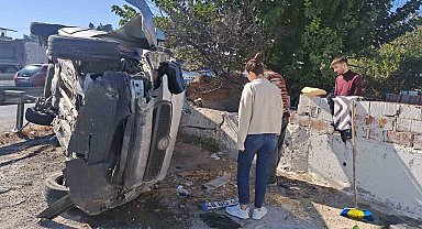 Kontrolden çıkan araç yan yattı