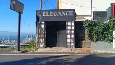 Çocuklarının gözü önünde babaya tokat atan şahsın iş yerine silahlı saldırı