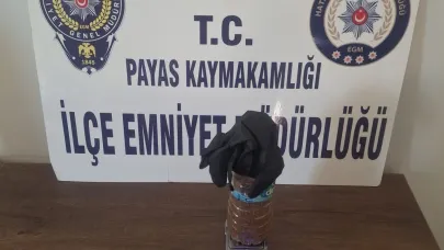 Polisi görünce bahçeye attığı su şişesinden uyuşturucu çıktı
